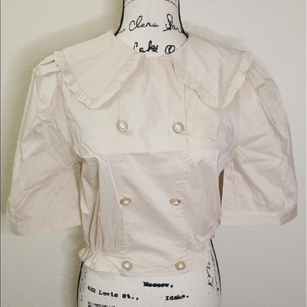 Beige blouse ruffle sleeve